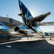 Le vaisseau SpaceShipTwo sous son avion porteur WhiteKnightTwo, à l'aéroport et spatioport de Mojave (Californie) le 22 février 2019