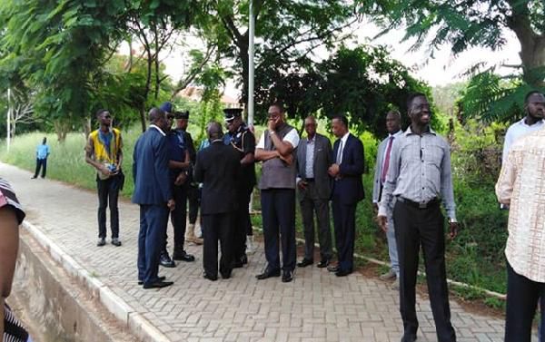 University authorities with police officials