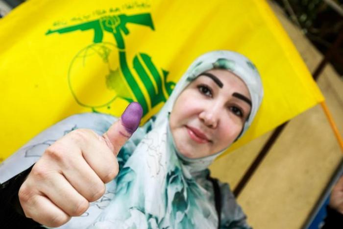 A 2018 general election confirmed Shiite militant group Hezbollah as a major political force in Lebanon but Britain has decided to ban it following an outcry over the display of its flag, which features a Kalashnikov assault rifle, at London rallies