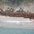 Myanmar troops and tanks move in formation along the shore during the second day of the 'Sin Phyu Shin' joint military exercises in Ayeyarwaddy delta region in 2018