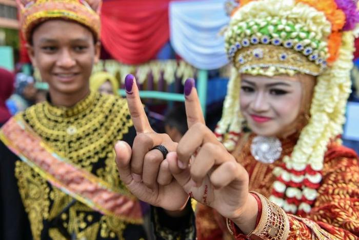 More than 190 million voters are choosing between an incumbent president lauded for his infrastructure projects and a fiery nationalist with links to a brutal dictatorship