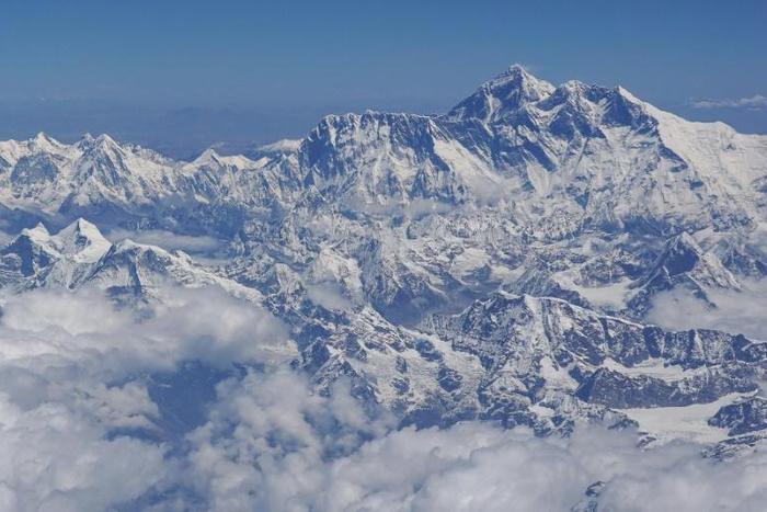 Late April to the end of May is the peak climbing season for Mount Everest (centre R) and many Himalayan mountains