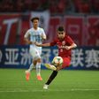 Hat-trick hero: Shanghai SIPG's Oscar curls home his second, a beauty from the edge of the box against Ulsan