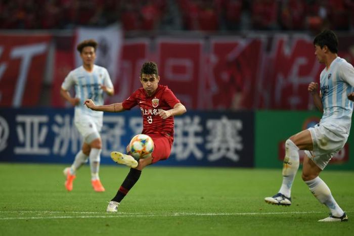 Hat-trick hero: Shanghai SIPG's Oscar curls home his second, a beauty from the edge of the box against Ulsan