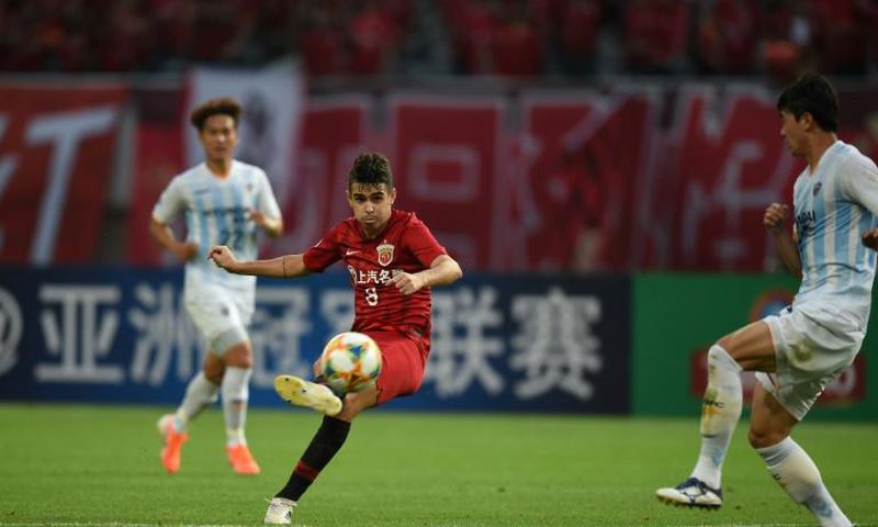 Hat-trick hero: Shanghai SIPG's Oscar curls home his second, a beauty from the edge of the box against Ulsan