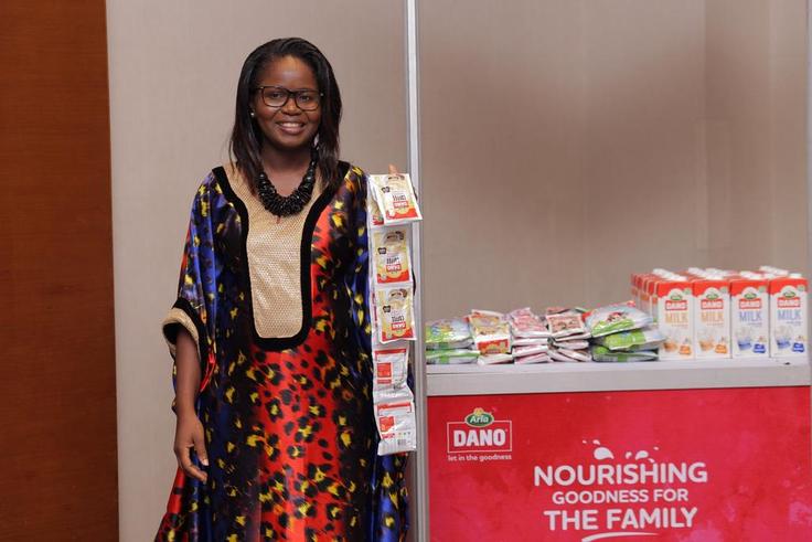 Arla Dano Country Manager, Fatoumata Doro with packs of the NEW DANO Coffee Flavoured Milk