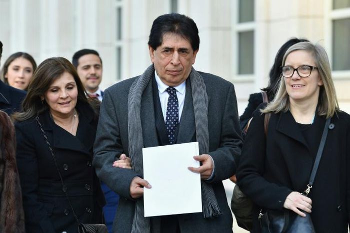A US federal judge has authorized Brayan Jimenez, center, who presided over Guatemala's National Football Federation between December 2009 and May 2015, to take back his passport and return to his country