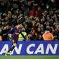 On target: Lionel Messi celebrates his goal on Saturday