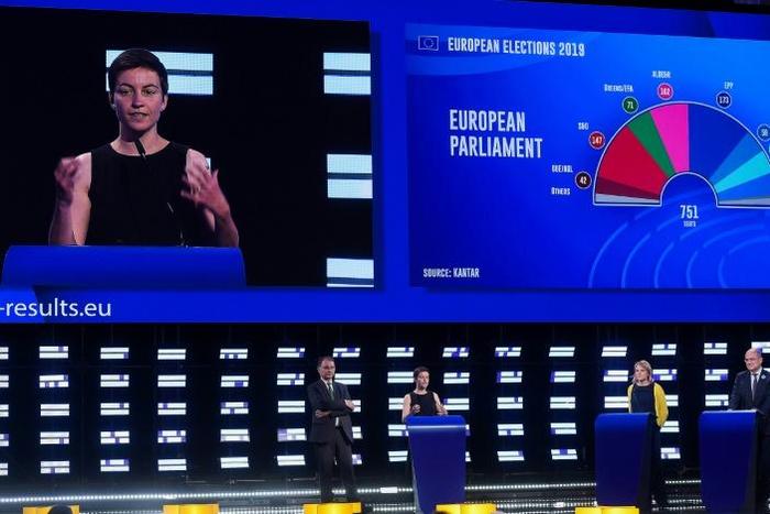 Top candidate of the European Green party Ska Keller (2nd-L) gives a speech inside the European Parliament in Brussels as results show a surge in support for environmentalist political parties over climate change