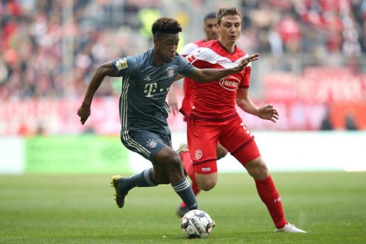 Kingsley Coman fired Bayern Munich back to the top of the Bundesliga on Sunday
