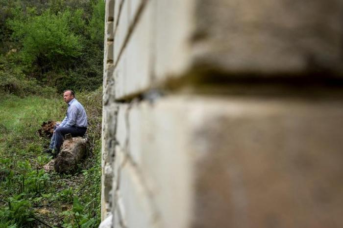 Jovan Plaku unearthed the remains of 13 people after hunting for the body of his father, executed by Albania's ex-communist regime