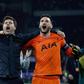 Tottenham manager Mauricio Pochettino celebrates with Hugo Lloris after their stunning win at Ajax