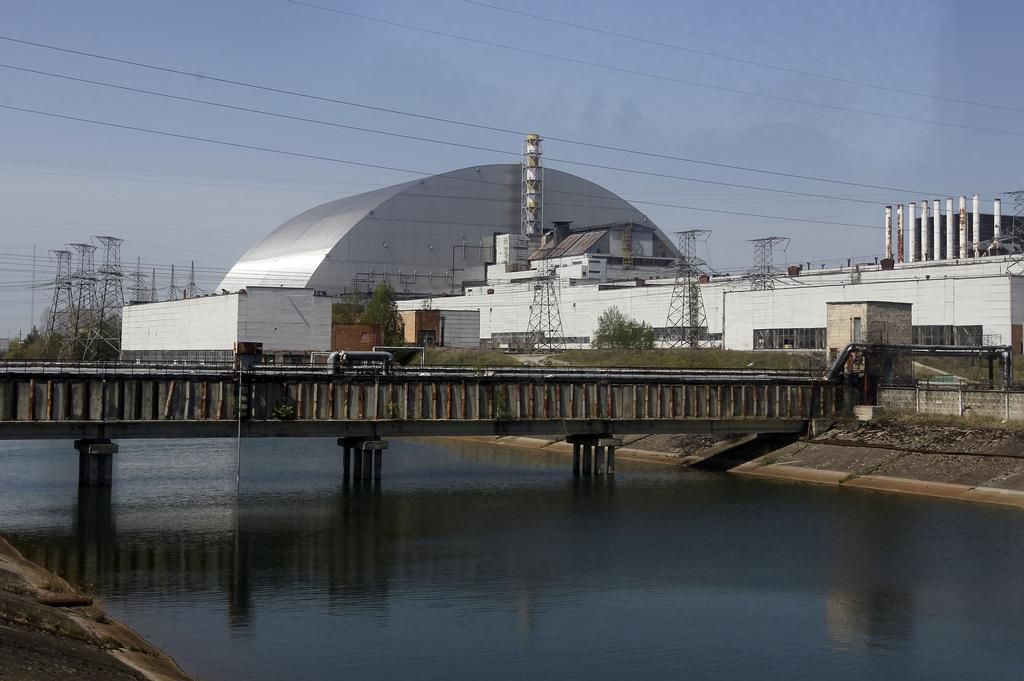 The general view of the New Safe Confinement covering the...