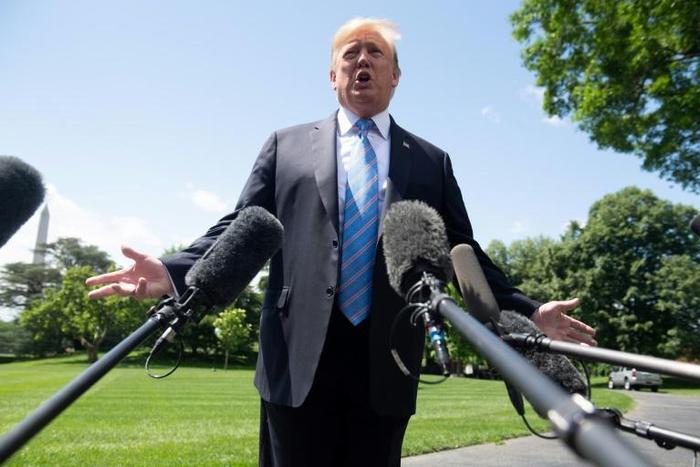 US President Donald Trump told reporters that the escalating battle with China on trade was "a little squabble"