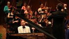 A pianist swings hard in both classical and jazz