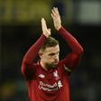 Liverpool midfielder Jordan Henderson applauds the fans after his side drew with Everton at Goodison Park