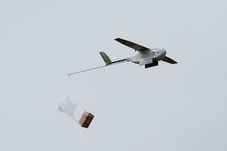 A Zipline delivery drone releases its payload midair during a flight demonstration at an undisclosed location in the San Francisco Bay Area, California, U.S., May 5, 2016. REUTERS/Stephen Lam
