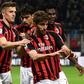 AC Milan's Italian forward Fabio Borini (R) celebrates with teammates after scoring in a 2-1 win over Bologna.