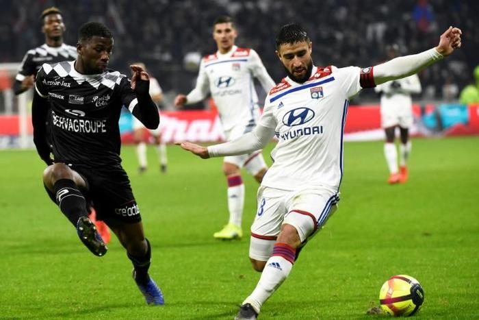 Nabil Fekir (R) came through Lyon's youth system and is now the club's captain as well as a World Cup winner