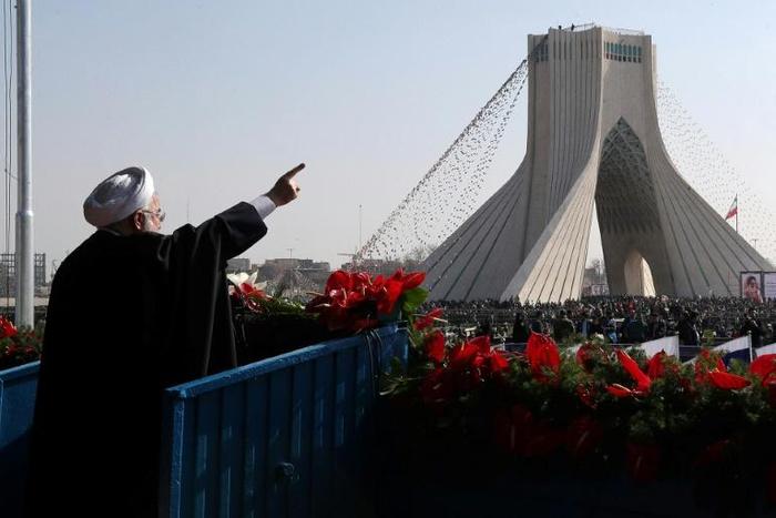 Iranian President Hassan Rouhani on February 11, 2018 delivers a speech at Azadi Square in the capital Tehran during a ceremony to mark the 39th anniversary of the Islamic Revolution