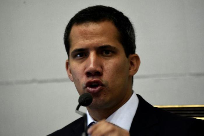 Venezuelan opposition leader and self-proclaimed interim president Juan Guaido speaks during a session of the National Assembly in Caracas on April 9, 2019