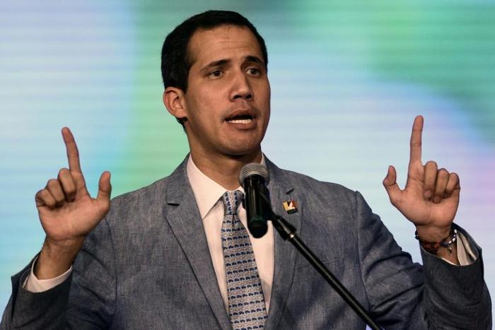 The president of Venezuela's National Assembly and self-proclaimed acting president Juan Guaido delivers a speech at the Central University of Venezuela (UCV) in Caracas on February 8, 2019