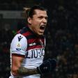 Paraguayan forward Federico Santander sealed a first win for Bologna in over four months in the San Siro