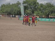 Wa Model players celebrate after Taslim scores from a free-kick
