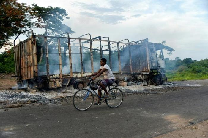 As well as the killings, houses, cars and other property were burned during the violence