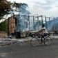 As well as the killings, houses, cars and other property were burned during the violence