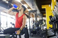 Athlete drinking protein drink