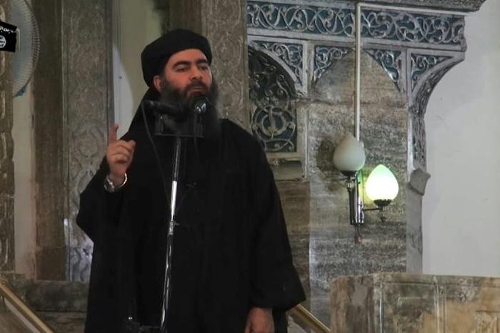 Islamic State group leader Abu Bakr al-Baghdadi speaks at a mosque in Iraq's Mosul in a propaganda video released by Al-Furqan Media on July 5, 2014 -- his only public appearance prior to the release of a new purported video of him on Monday