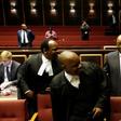 Zuma (second R) told supporters outside the court he has had to sell hats and socks to pay legal fees