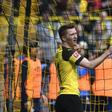 Marco Reus was sent off as Dortmund suffered a critical blow to their title race hopes with a derby defeat on Saturday