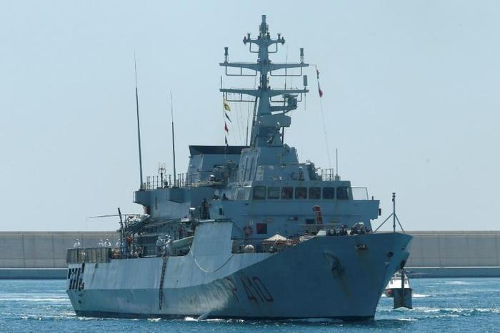 An Italian navy ship, like the one pictured June 2018, came to the migrants' aid after the engine on their inflatable boat failed in worsening weather