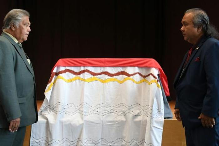 The coffin with the remains of an Aboriginal ancestral king is draped with an Aborginal flag as the Five Continents museum in Munich handed it over to Australia
