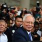 Former prime minister Najib Razak (shown at the start of his trial on April 3) and his cronies are accused of stealing billions of dollars from 1MDB and spending it on everything from high-end real estate to artworks and a luxury yacht