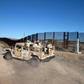Mexican soldiers drive along a section of the US-Mexico border fence in Sonoyta, Mexico on February 16, 2017