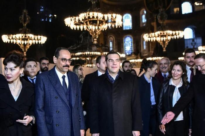 Tsipras (C-R) is on an official visit to Turkey for talks to ease tensions over bilateral disputes and the long-running Cyprus problem
