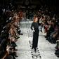 British fashion designer Stella McCartney acknowledges the applause at the end of her Paris fashion week show