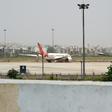 More than 80 domestic and international Air India flights were delayed because of a problem with the company's check-in software