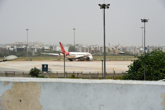 More than 80 domestic and international Air India flights were delayed because of a problem with the company's check-in software
