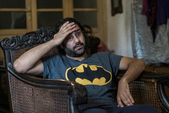 Egyptian activist Alaa Abdel Fattah, released from prison in March, must now spend nights in a police cell as part of his probation