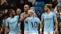 Kompany man: Manchester City captain Vincent Kompany celebrates his goal against Leicester