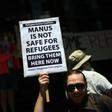 A refugee advocate protests against asylum-seeker camps in Sydney. The issue has long been a political football in the country