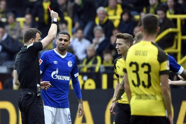Marco Reus was sent off for a studs-up challenge on Schalke's Suat Serdar during Saturday's derby