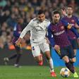 Barcelona's Argentinian forward Lionel Messi controls the ball during the Spanish Copa del Rey (King's Cup) semi-final first leg against Real Madrid