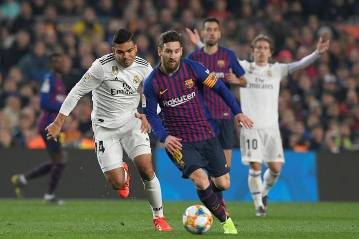 Barcelona's Argentinian forward Lionel Messi controls the ball during the Spanish Copa del Rey (King's Cup) semi-final first leg against Real Madrid