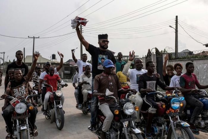 US-Nigerian musician Olubankole Wellington, popularly known as Banky W., rode with supporters in a line of motorcycles during a campaign rally in Lagos