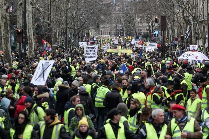 'Switch off your telly. Come and meet us': thousands of 'yellow vest' demonstrators marched in Paris